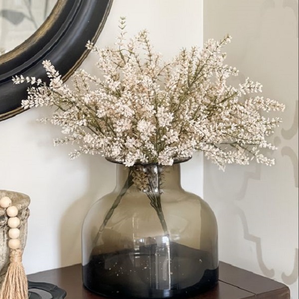 Learn how to arrange flowers in a vase 