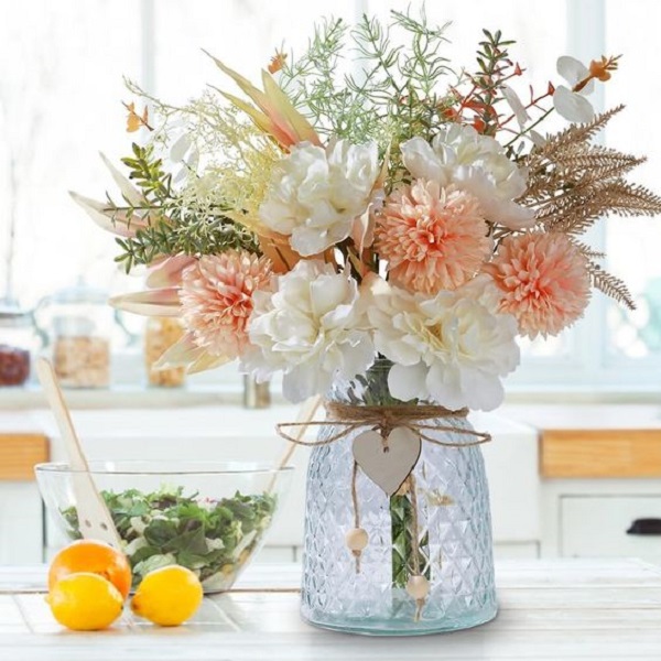 Learn how to arrange flowers in a vase 