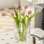 Learn how to arrange flowers in a vase