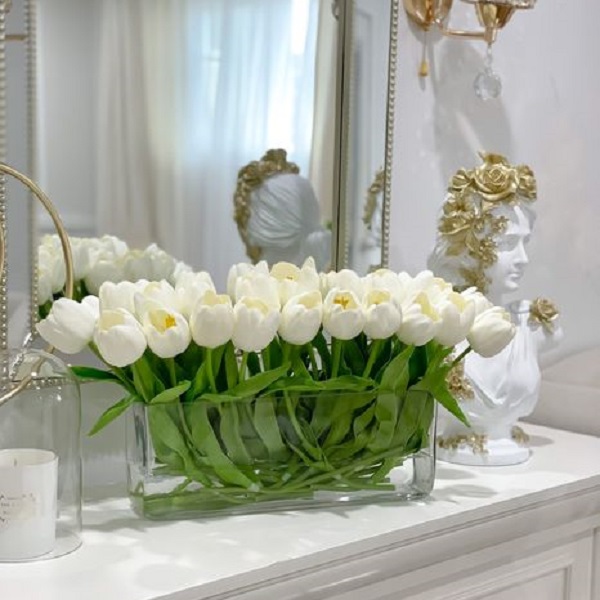 Learn how to arrange flowers in a vase