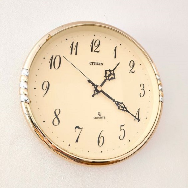 Elevate your living room's charm with our exquisite wall clock