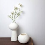 white flower vase